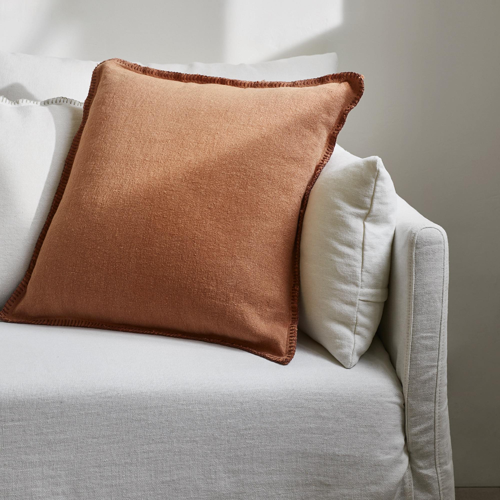 Nino orange clay and festoon cushion cover
