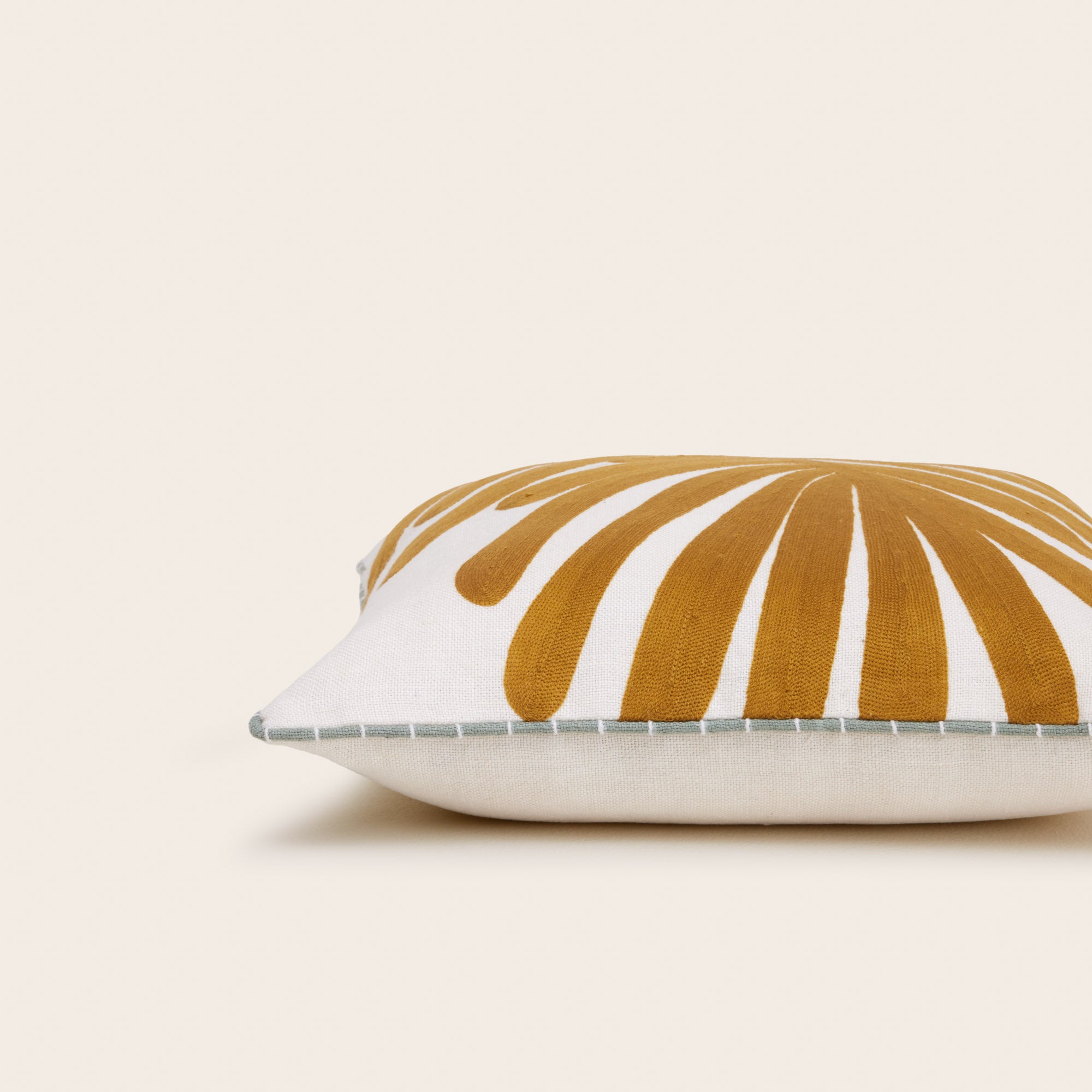 TROPI ecru and mustard cushion cover